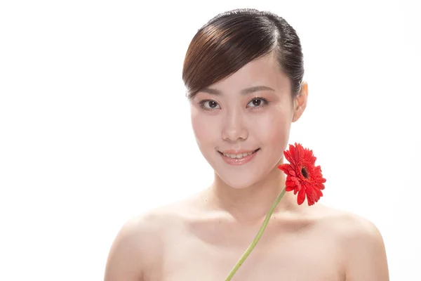 Макияж лица азиатки с цветами — стоковое фото