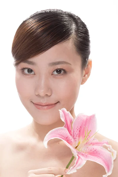 Facial makeup of asian woman with flower — Stock Photo, Image