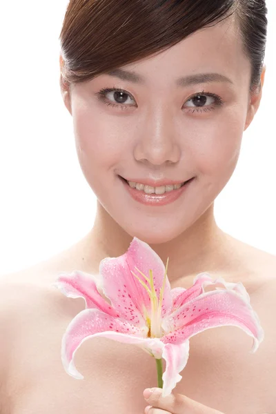 Facial makeup of asian woman with flower — Stock Photo, Image