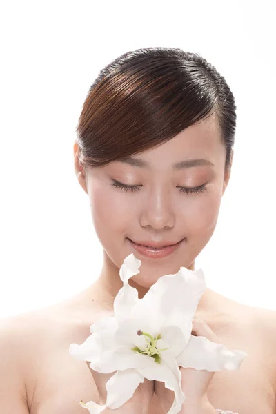 Maquillaje facial de mujer asiática con flor —  Fotos de Stock
