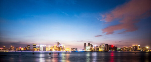 night scene of Hangzhou city near river