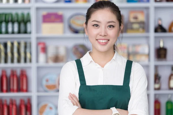 young pretty woman works in retail