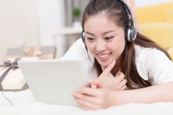 chinese woman listening music in room