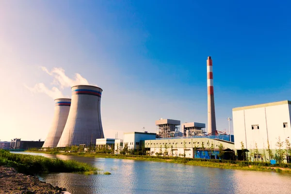 Modern power plant near river — Stock Photo, Image