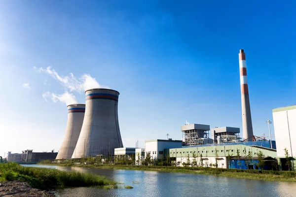 Modern power plant near river — Stock Photo, Image