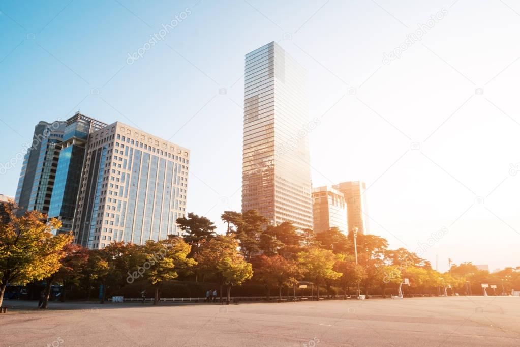 empty basketball court near modern buildings