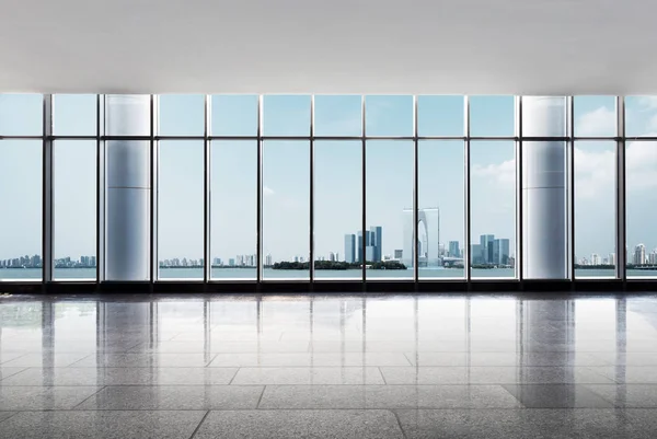 Floor and cityscape of modern city from window — Stock Photo, Image