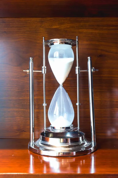 Elegance hourglass on table — Stock Photo, Image