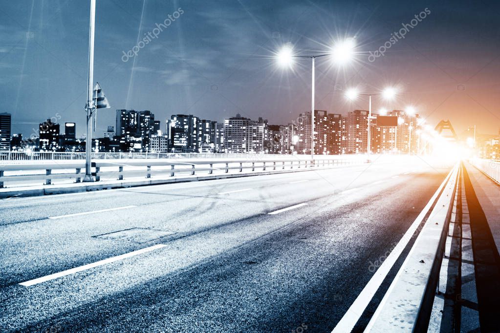 traffic on bridge at night in Seoul