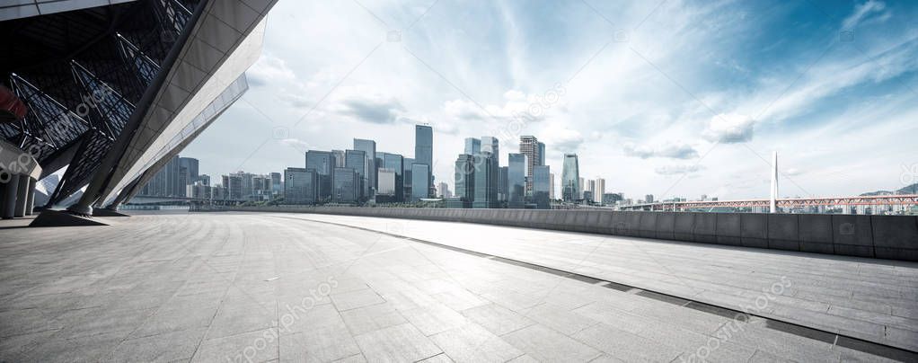 empty floor with modern cityscape and skyline 