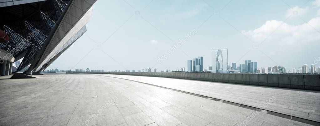empty floor with modern cityscape and skyline 