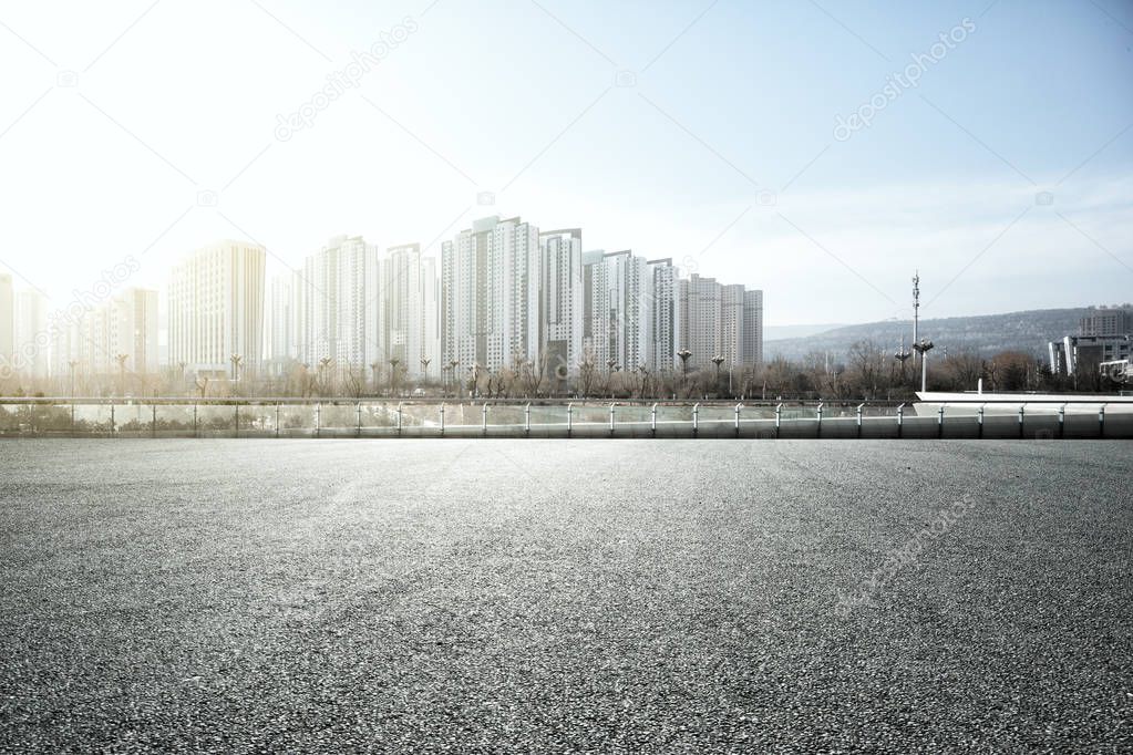 empty floor with cityscape of modern city 