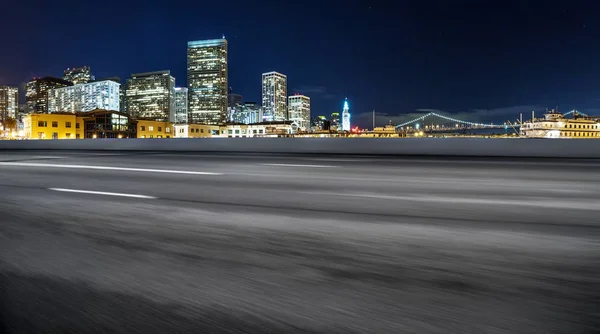 empty road with cityscape of modern city