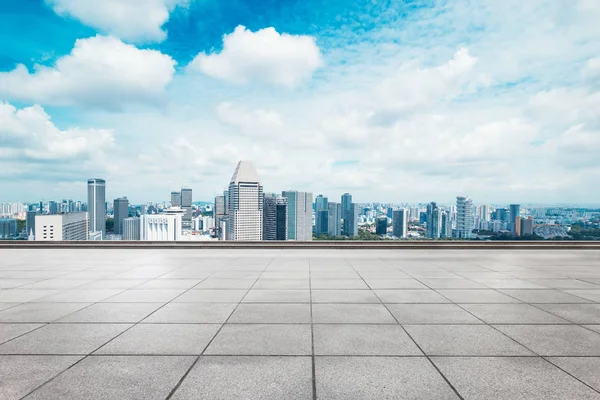 Empty floor with cityscape of modern city — Stock Photo, Image