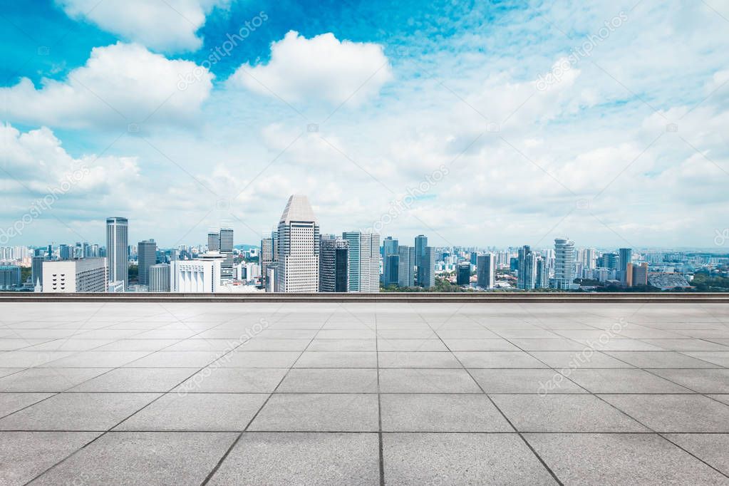 empty floor with cityscape of modern city