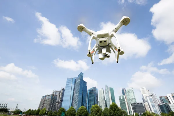 drone flying over modern city