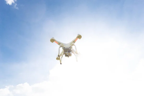 Flying drone in blue sky — Stock Photo, Image