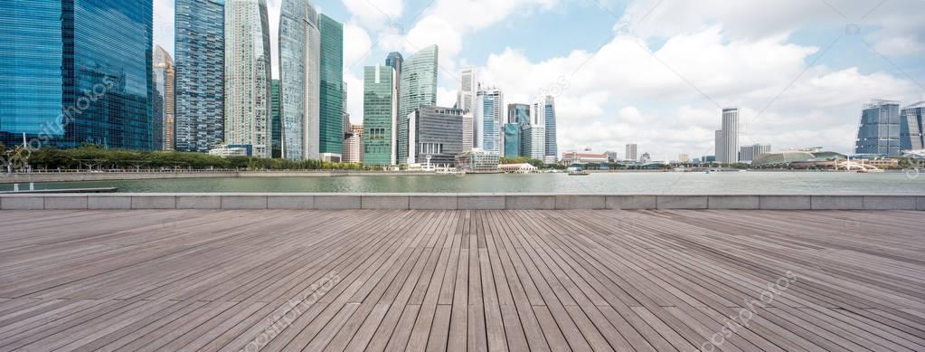 wooden floor with cityscape of modern city