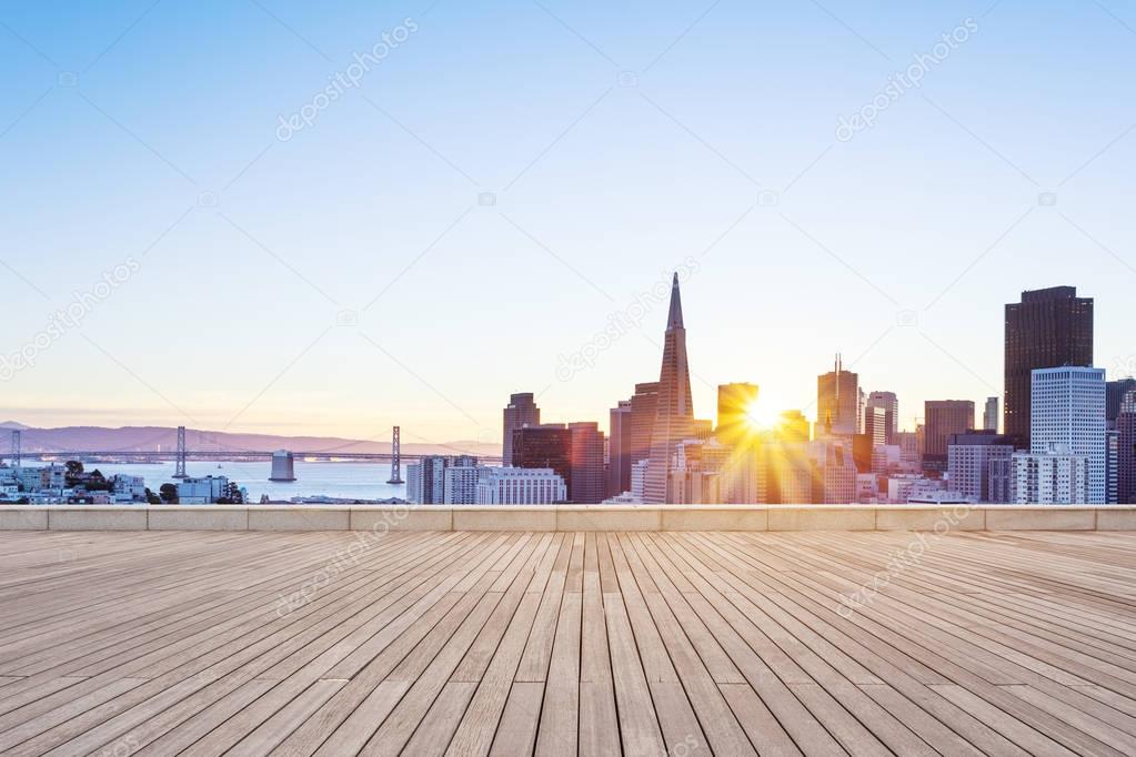 wooden floor with cityscape of modern city