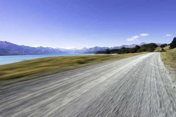 Empty road with blue sea — Stock Photo, Image