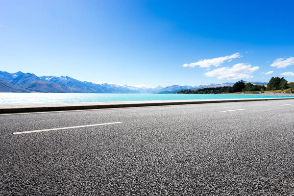 empty road with blue sea