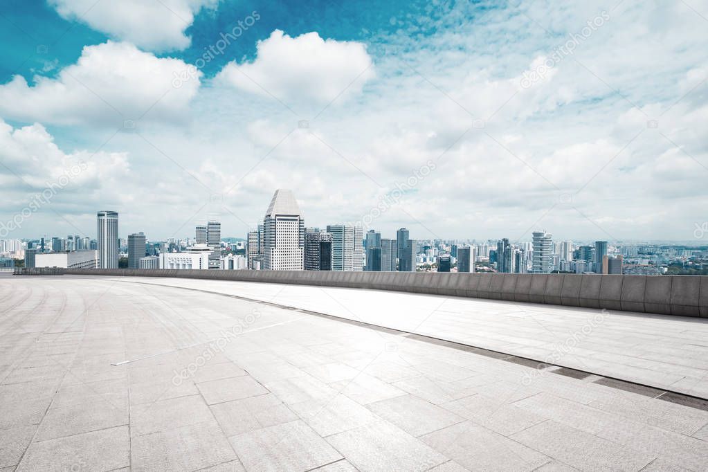 empty floor with cityscape of modern city