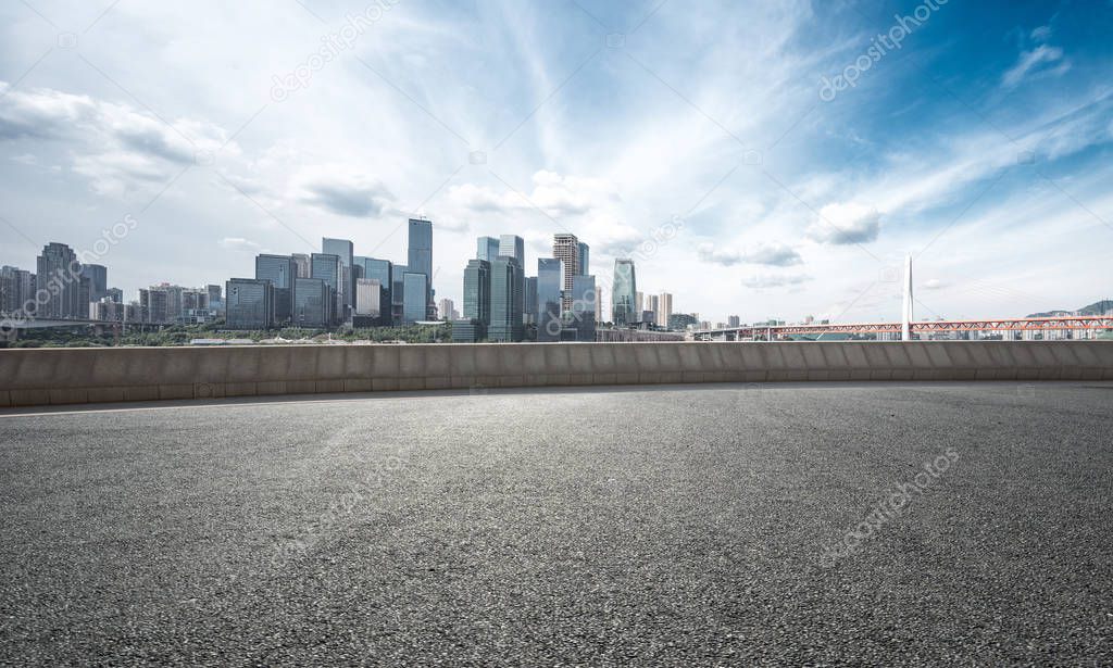 empty road with cityscape 