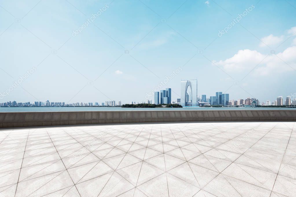 cityscape of Suzhou from empty brick floor