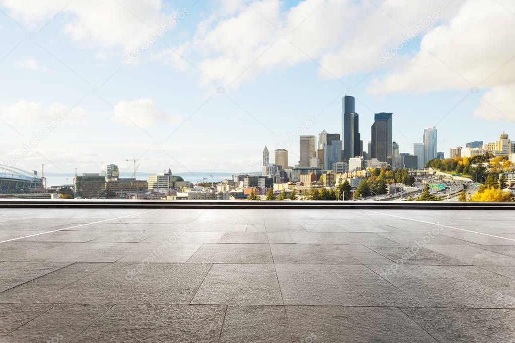 empty brick floor with cityscape of Los Angeles