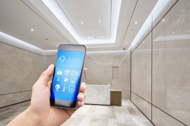 cep telefonu ile app akıllı ev resepsiyon masası modern ofis binası