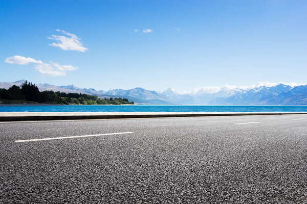 landscape of blue sea from empty road