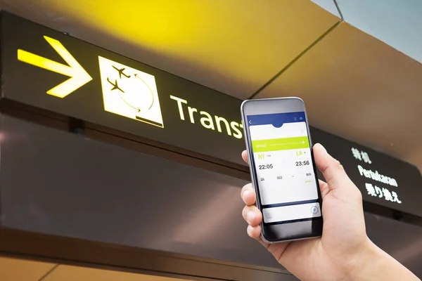 mobile phone with transfer sign in airport