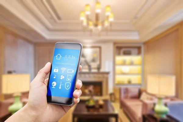Mobile phone with living room in smart home — Stock Photo, Image