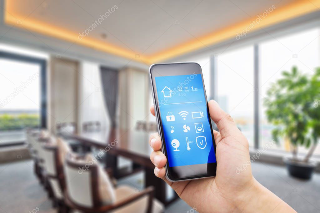 smart phone with apps in luxury meeting room