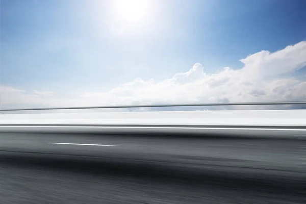 Empty road with blue sky — Stock Photo, Image