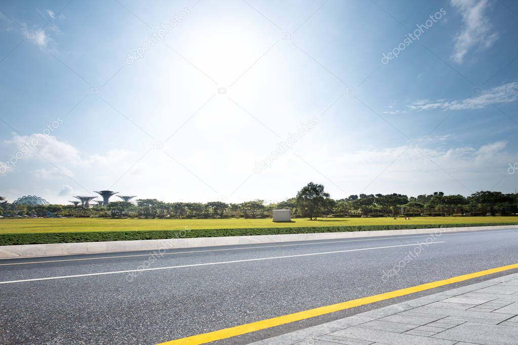 empty road near grassland 