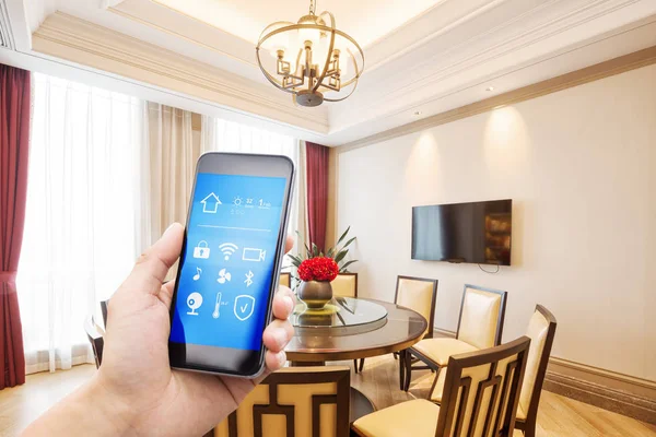 Mobile phone in smart home — Stock Photo, Image