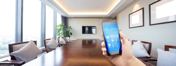 Mobile phone in smart home with painted table — Stock Photo, Image