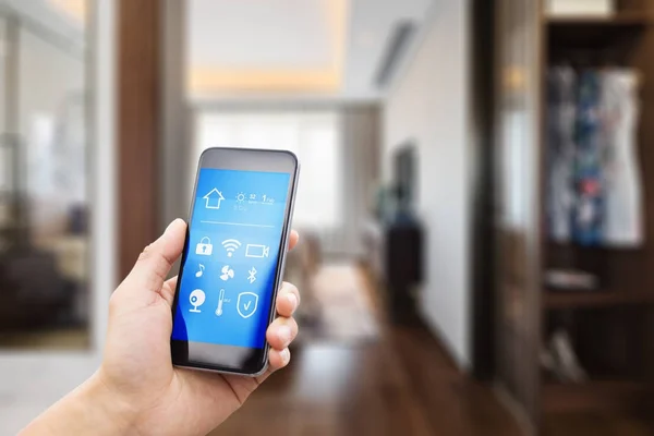 Mobile phone in smart home — Stock Photo, Image