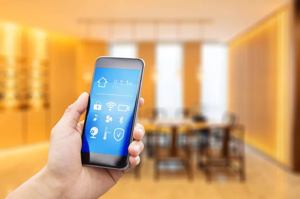 Mobile phone in modern dining room — Stock Photo, Image