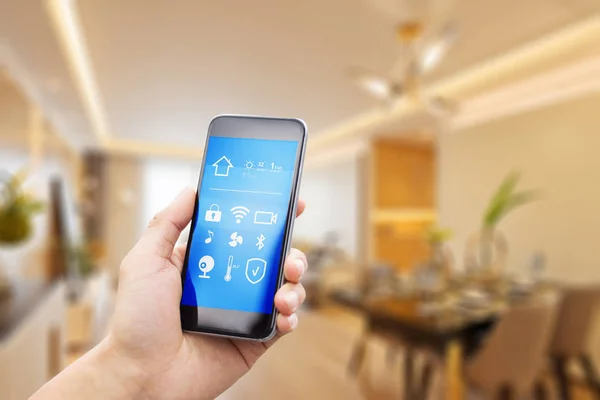 Mobile phone in smart home — Stock Photo, Image