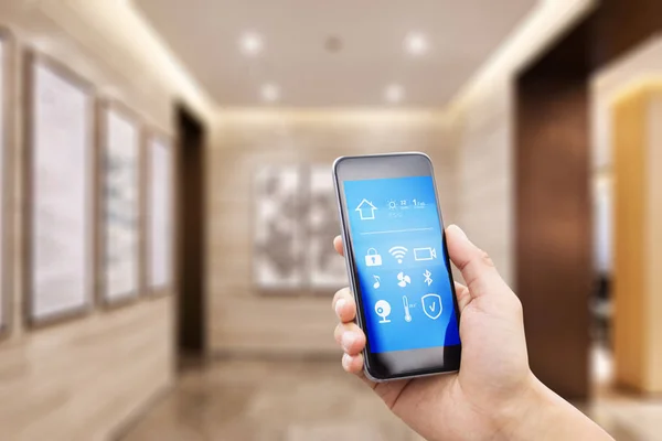 Mobile phone in smart home — Stock Photo, Image