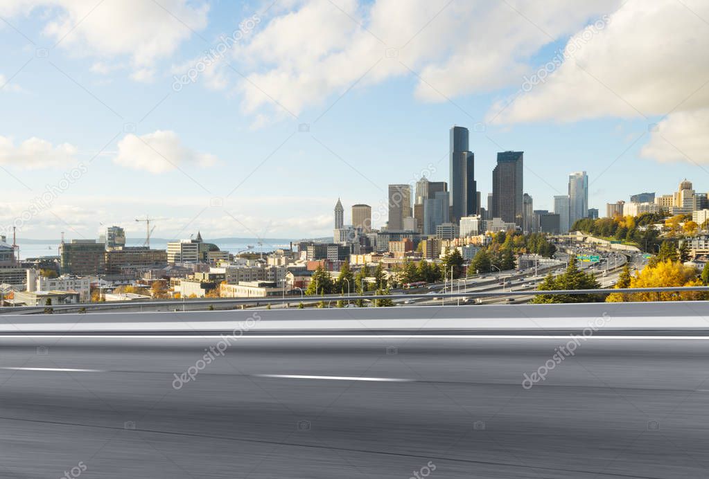 empty asphalt road with cityscape 
