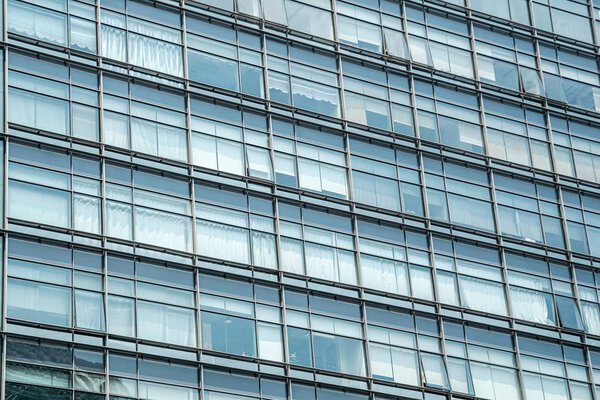 Close up view of glass wall of modern building