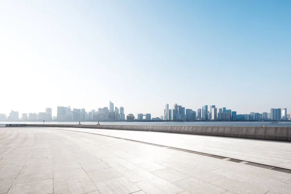 Empty marble floor with cityscape — Stock Photo, Image