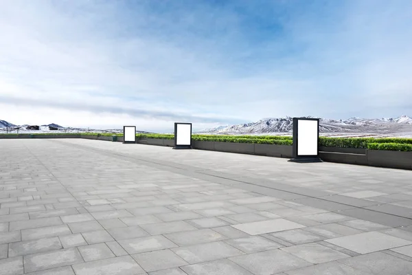 Empty marble floor with snow mountains — Stock Photo, Image