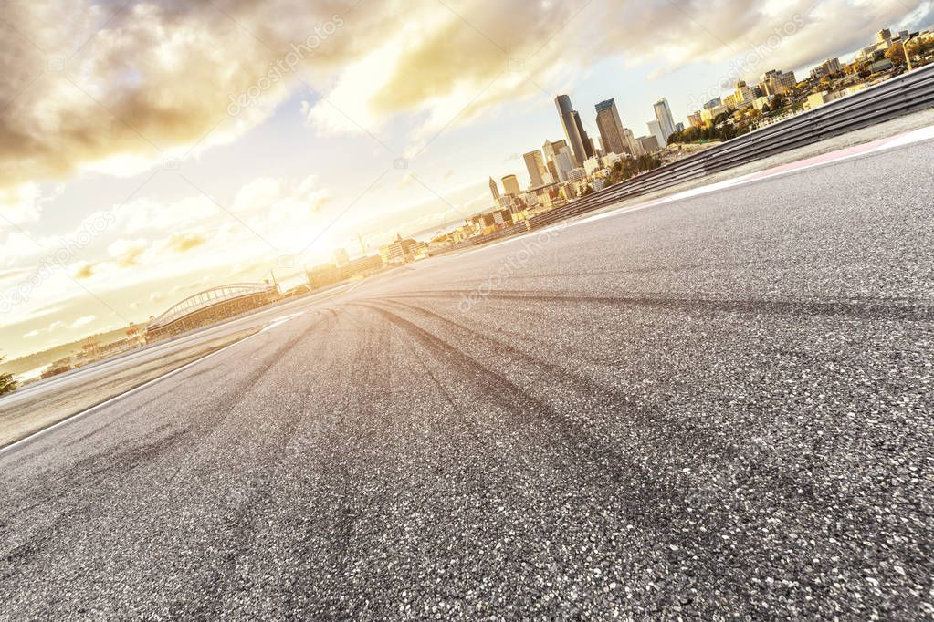 asphalt road with cityscape of modern city