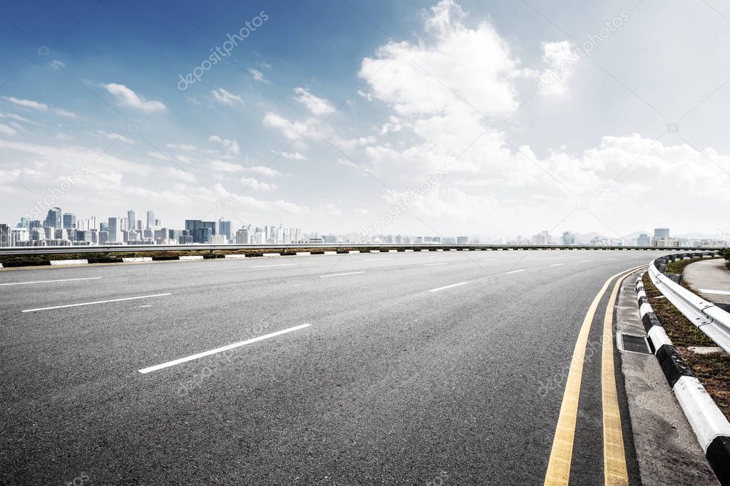empty asphalt road and cityscape of Hangzhou 