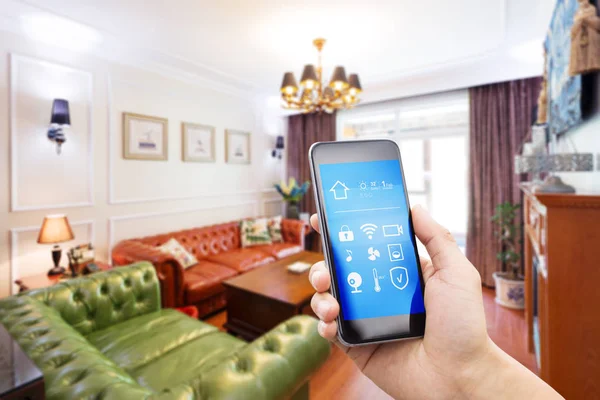 Mobile phone in modern living room — Stock Photo, Image