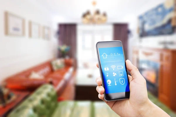 Mobile phone in modern living room — Stock Photo, Image